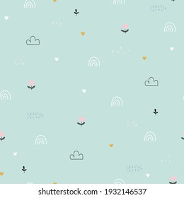 Delicate seamless pattern with small flowers leaves and rainbows on a green background. Print for baby bed linens, fabric, textiles, wallpaper, wrapping paper.