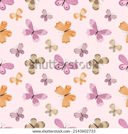 Delicate seamless pattern with a variety of colorful butterflies on a light pink background.