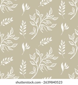 Delicate seamless pattern with various hand-drawn silver leaf branches on a beige background. A light and airy botanical design for elegant stationery and textiles.