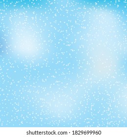 Delicate sky background with falling snowflakes