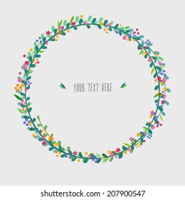 delicate spring wreath with flowers and leaves