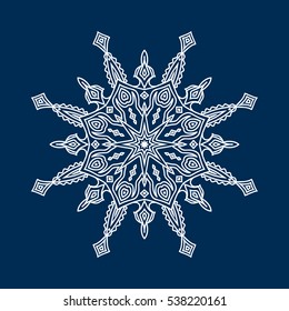 Delicate white Christmas snowflake on blue background