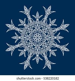 Delicate white Christmas snowflake on blue background