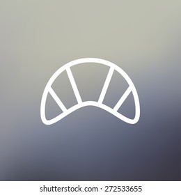 Delicious baked croissant icon thin line for web and mobile, modern minimalistic flat design. Vector white icon on gradient mesh background.