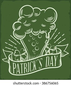 Delicious beer with greeting ribbon and lucky clovers for St. Patrick's Day.