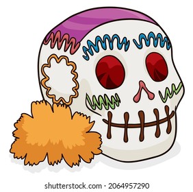 Delicious candy skull -called 'calavera' in Mexico- with colorful decoration and marigold flower, ready for Day of the Dead celebration.