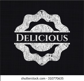 Delicious chalk emblem written on a blackboard