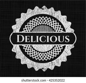 Delicious chalk emblem written on a blackboard