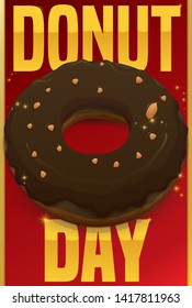 Delicious chocolate doughnut with peanut toppings and glows over a sign with golden greeting message for Donut Day celebration.