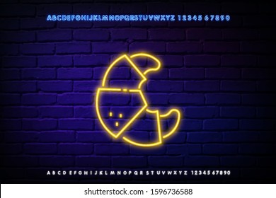 Delicious croissant neon light icon. Glowing sign with alphabet, numbers and symbols. Traditional french delicacy, fresh baking vector isolated illustration. Tasty confection, sweet breakfast snack