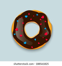 Delicious donut with sprinkles on a blue background