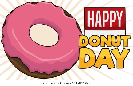 Delicious donut with strawberry glaze and calendar with reminder for a happy Donut Day celebration.