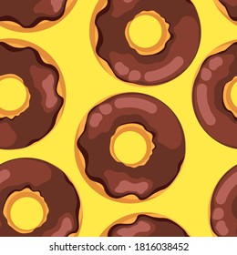 Delicious fresh sweet donut from a pastry bakery. Dessert coated with colored glaze. High-calorie chocolate brown sweet snack. Seamless background with pattern.