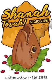 Delicious fried fish head served with lettuce, some pomegranate seeds, good wishes and greetings ("Shanah Tovah", written in Hebrew) for Jewish New Year or Rosh Hashana celebration.