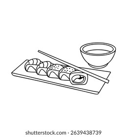Delicious japanese sushi rolls with soy sauce and chopsticks on a wooden platter