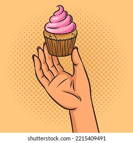 delicious sweet cupcake in female hand pinup pop art retro vector illustration. Comic book style imitation.