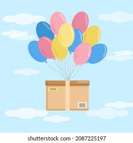 Concepto de entrega - una caja que vuela sobre globos	