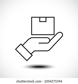 Delivery concept. Hand holding package. Flat style, Vector illustration