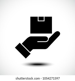 Delivery concept. Hand holding package. Flat style, Vector illustration