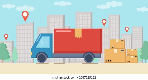 Delivery concept - truck carrying boxes in the city	