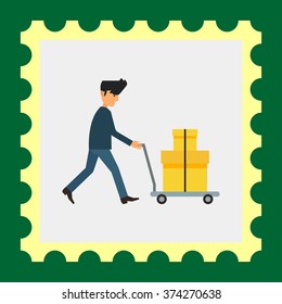 Delivery man carrying boxes on trolley