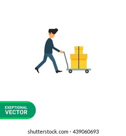 Delivery man carrying boxes on trolley