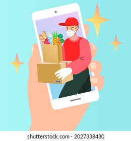 Delivery man red uniform with face mask holding box. Safe food delivery at home during coronavirus covid-19 epidemic delivery man holding a bag with fast food, he is wearing a face mask and gloves.