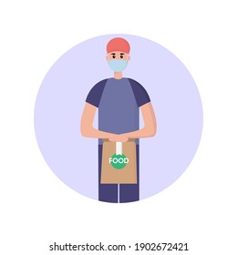 Delivery man is wearing a mask and holding a bag with food. Safe food delivery at home during coronavirus covid-19 pandemic. Delivery concept