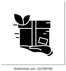 Delivery service glyph icon.Eco-friendly service.Hand holding product in green recyclable package. Environment-friendly transportation concept.Filled flat sign. Isolated silhouette vector illustration