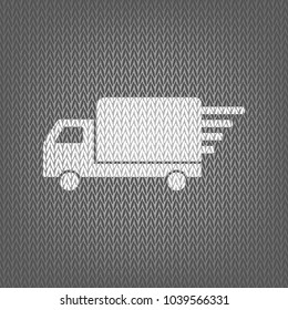 Delivery sign illustration. Vector. White knitted icon on gray knitted background. Isolated.