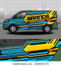 Delivery van vector design. Car sticker. Car design development for the company. Blue and yellow stripes on black background for car vinyl decal
