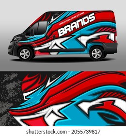 Diseño vectorial de la camioneta de entrega. Etiqueta del coche. Desarrollo de diseño de coches para la empresa. Fondo negro con líneas abstractas rojas y azules para pegatinas de vinilo de coche
