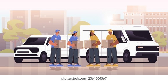 deliverymen holding cardboard boxes near delivery van couriers carrying parcels express delivery service happy labor day celebration