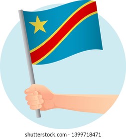Democratic Republic of the Congo flag in hand. Patriotic background. National flag of Democratic Republic of the Congo vector illustration