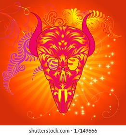 demonic skull with glamorous surface designs shown against a decorative background