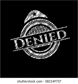 Denied chalkboard emblem written on a blackboard