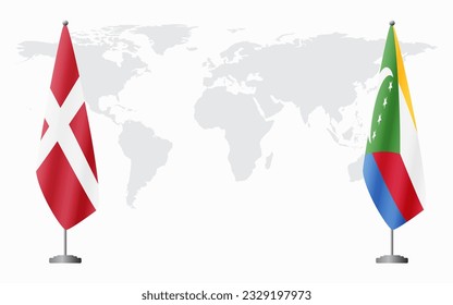 Denmark and Comoros flags for official meeting against background of world map.