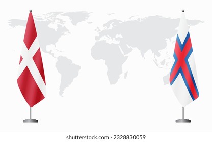 Denmark and Faroe Islands flags for official meeting against background of world map.