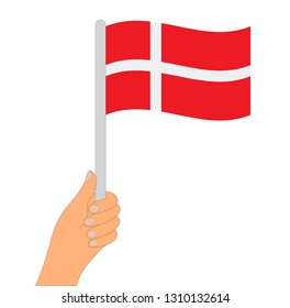 Denmark flag. Hand holding a Denmark flag - vector icon.