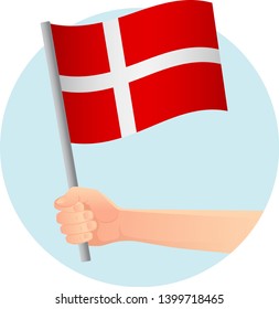 Denmark flag in hand. Patriotic background. National flag of Denmark vector illustration