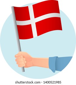 Denmark flag in hand. Patriotic background. National flag of Denmark vector illustration