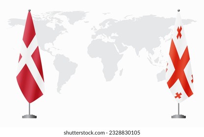 Denmark and Georgia flags for official meeting against background of world map.