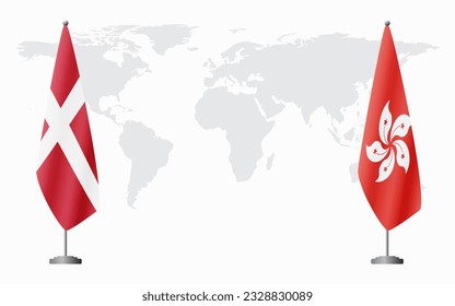 Denmark and Hong Kong flags for official meeting against background of world map.