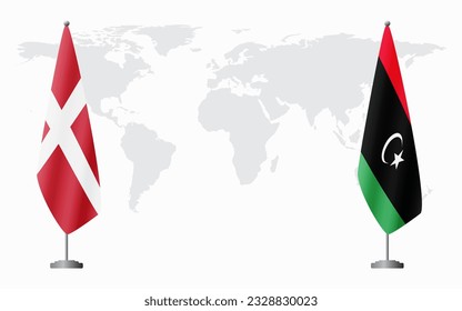 Banderas de Dinamarca y Libia para una reunión oficial en el fondo del mapa mundial.