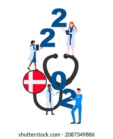 Denmark national flag on a stethoscope with doctors and year 2022 on a white background. Postcard on the topic of fighting the epidemic. Health workers in the new year.