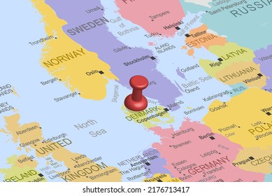 Denmark with red fastener pushpin on europe map, close up Denmark, pinned destination, travel idea, colorful map with location icon, vacation and road trip concept, top view