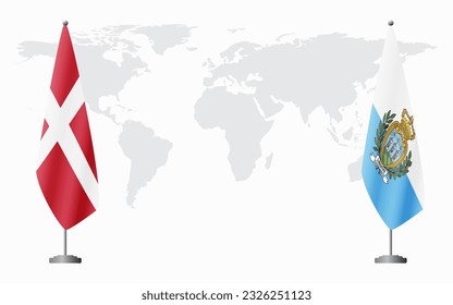 Denmark and San Marino flags for official meeting against background of world map.