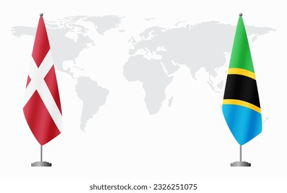 Denmark and Tanzania flags for official meeting against background of world map.