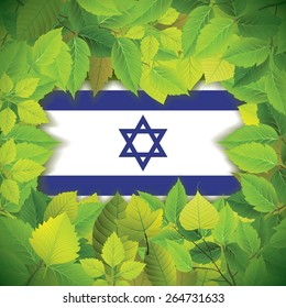 Dense, green leaves over the flag of Israel