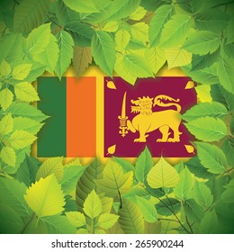 Dense, green leaves over the flag of Sri Lanka